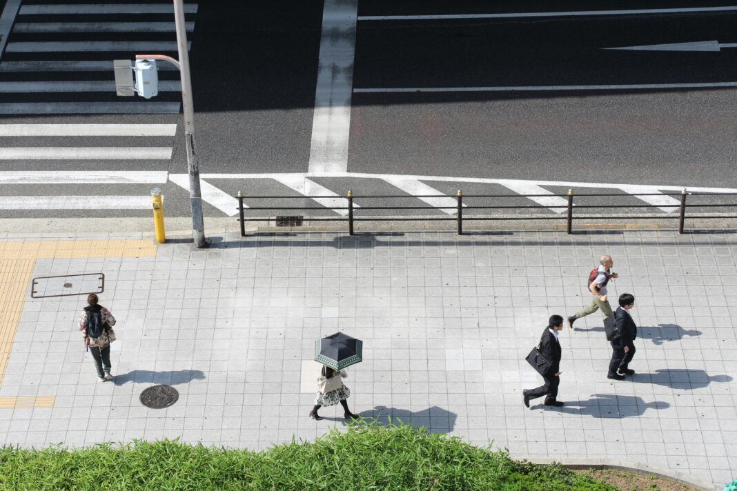 Pedestrians on sidewalk